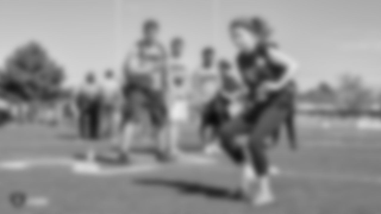 The Raiders, represented by alumnus Leo Gray, collaborate with the Las Vegas Metro Police Activities League to start a 7-on-7 NFL FLAG Passing League for high school junior varsity athletes, Saturday, April 20, 2019, at Rancho High School in Las Vegas, Nev.