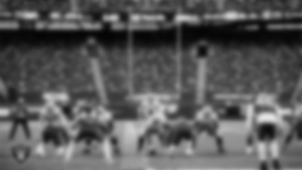 Las Vegas Raiders tackle Sam Young (70), center Rodney Hudson (61), tackle Denzelle Good (71) and quarterback Derek Carr (4) line up before the snap during the regular season away game against the New York Jets.