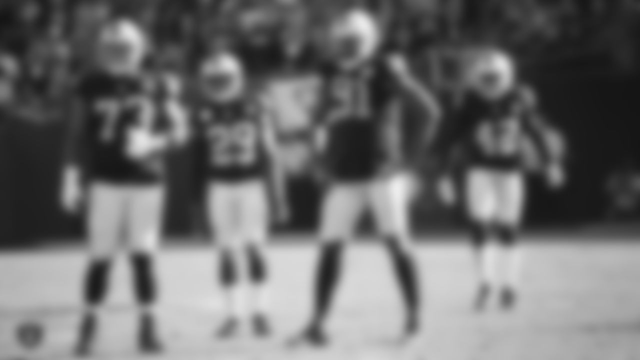 Raiders defensive tackle Maurice Hurst (73), safety Lamarcus Joyner (29), defensive end Benson Mayowa (91) and safety Karl Joseph (42) stand on the field during the regular season game against the Detroit Lions.