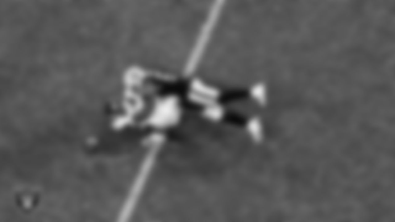 Las Vegas Raiders linebacker Nicholas Morrow (50) breaks up a pass during the regular season home game against the Denver Broncos.