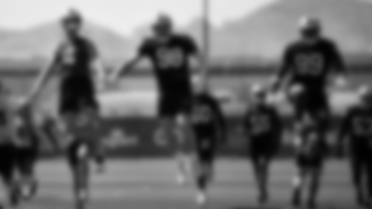 Las Vegas Raiders quarterback Derek Carr (4), defensive end Maxx Crosby (98) and defensive end Clelin Ferrell (99) at an Organized Team Activity (OTA).