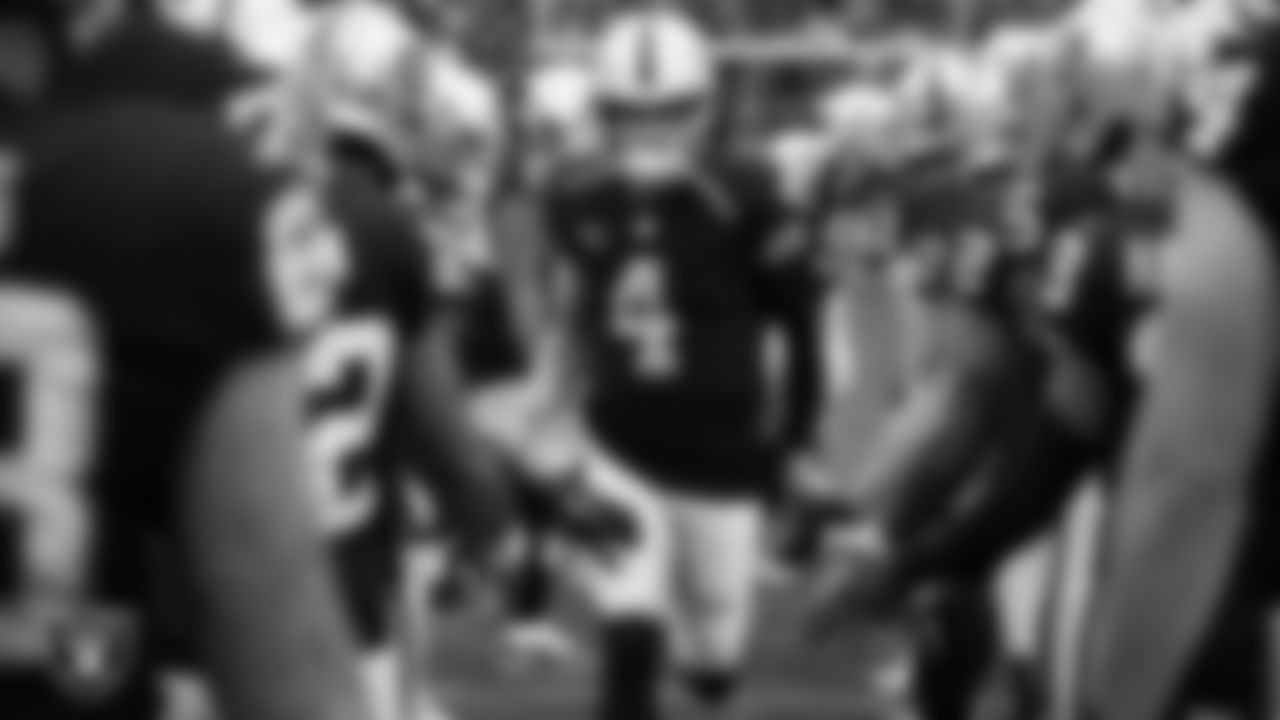 Las Vegas Raiders quarterback Derek Carr (4) is introduced onto the field before the regular season home game against the Washington Football Team.