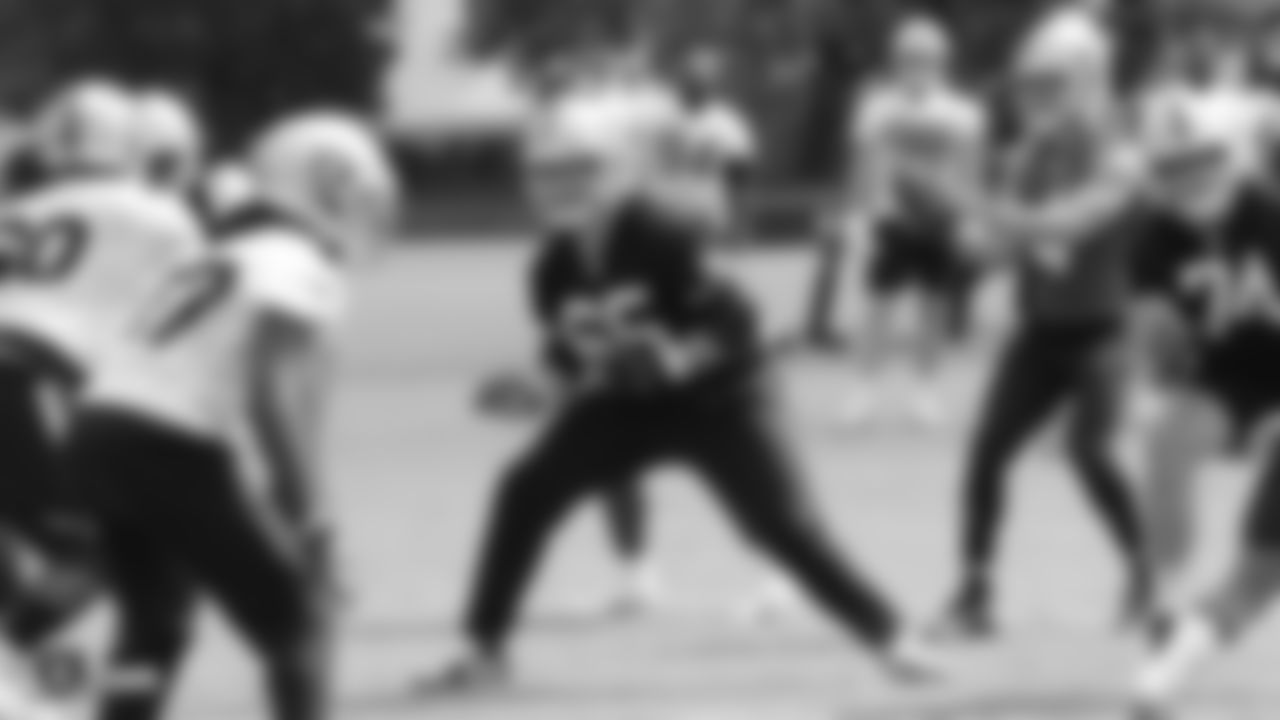 Raiders offensive lineman Jordan Devey (65) on the field for practice.