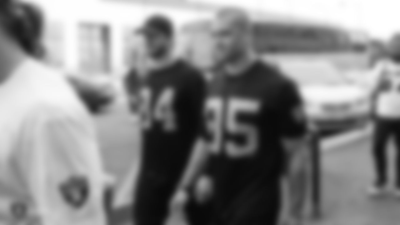 Oakland Raiders tight end Paul Butler (84) and tight end Derek Carrier (85) arrive to the field for a walk through at Bladium Sports & Fitness Club, Thursday, November 29, 2018, in Alameda, California.