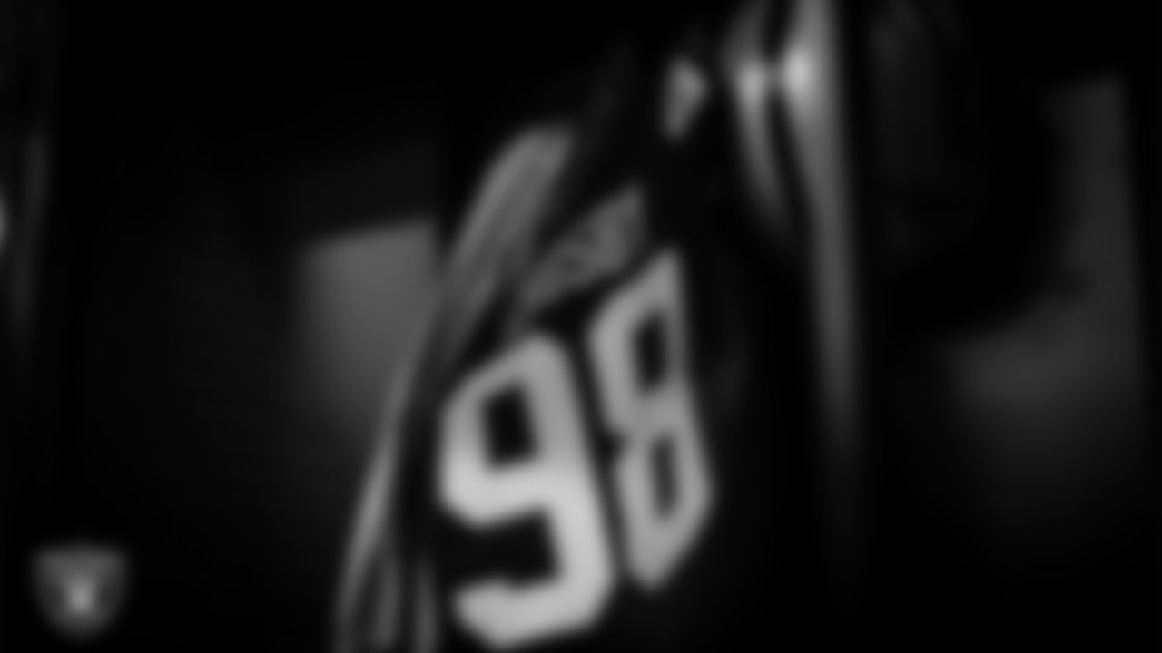 Las Vegas Raiders defensive end Maxx Crosby's (98) jersey hangs in the locker room prior to the Raiders arrival for their regular season away game against the Carolina Panthers.