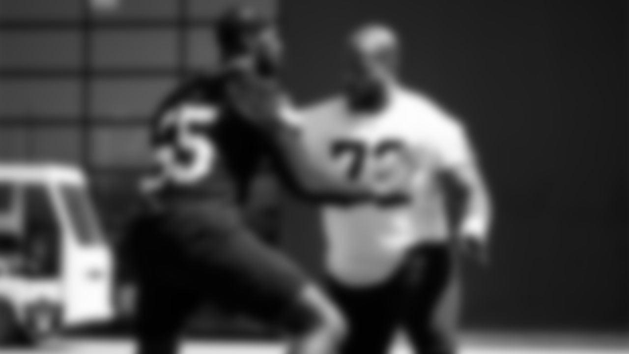Las Vegas Raiders defensive end Chandler Jones (55) and offensive lineman Jermaine Eluemunor (72) during Mandatory Minicamp.