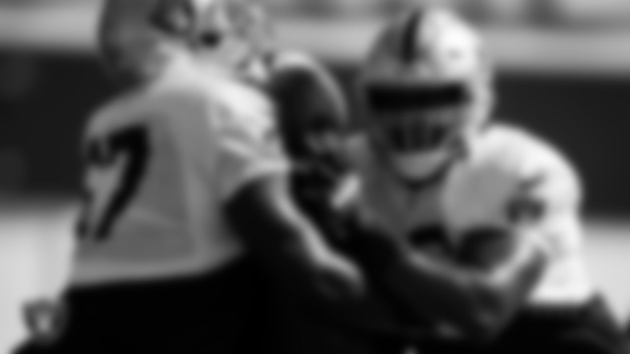 Las Vegas Raiders guard Lester Cotton Sr. (67) and guard John Simpson (76) on the field for practice at 2022 Training Camp at Intermountain Healthcare Performance Center.