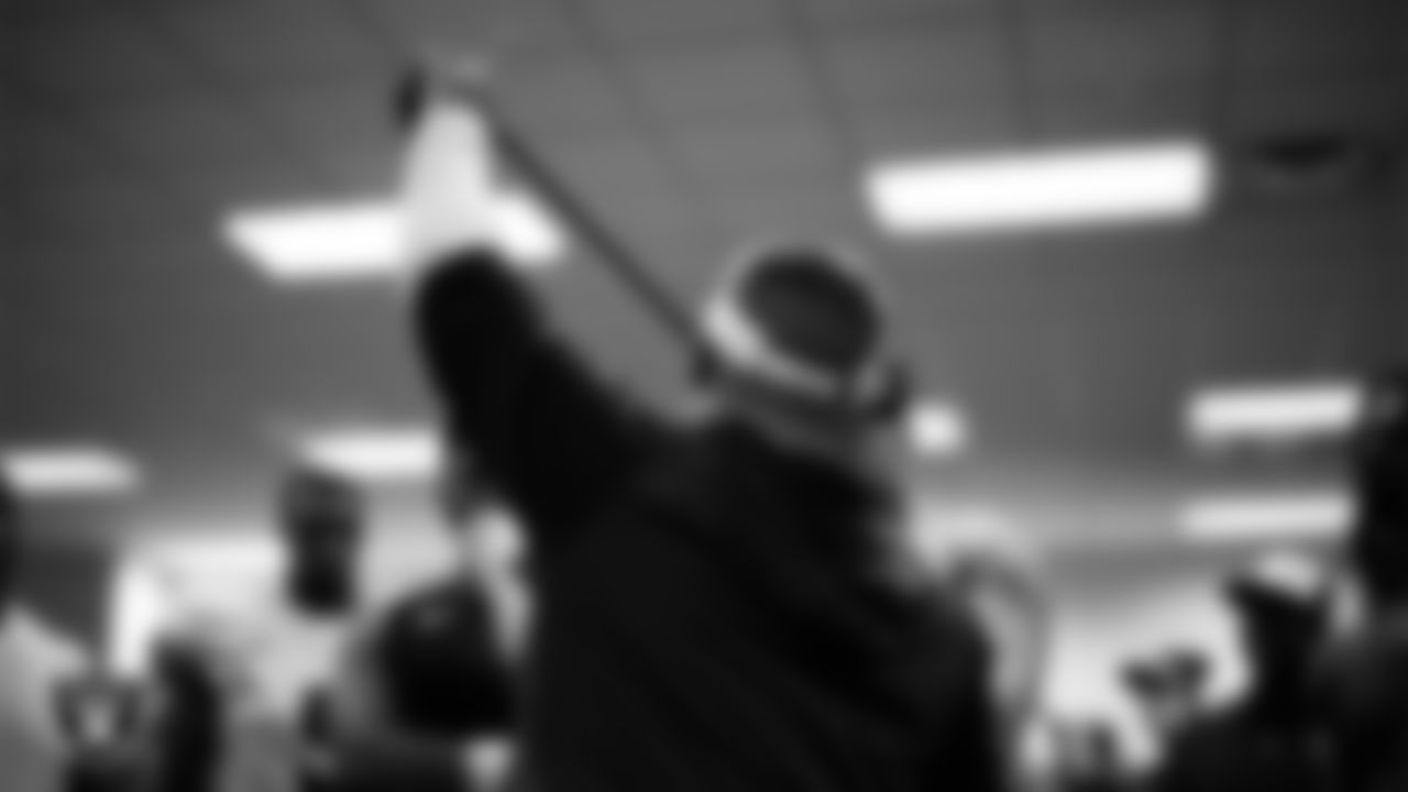 Las Vegas Raiders Head Coach Josh McDaniels addresses his players in the locker room after the regular season away game against the Denver Broncos at Empower Field at Mile High.
