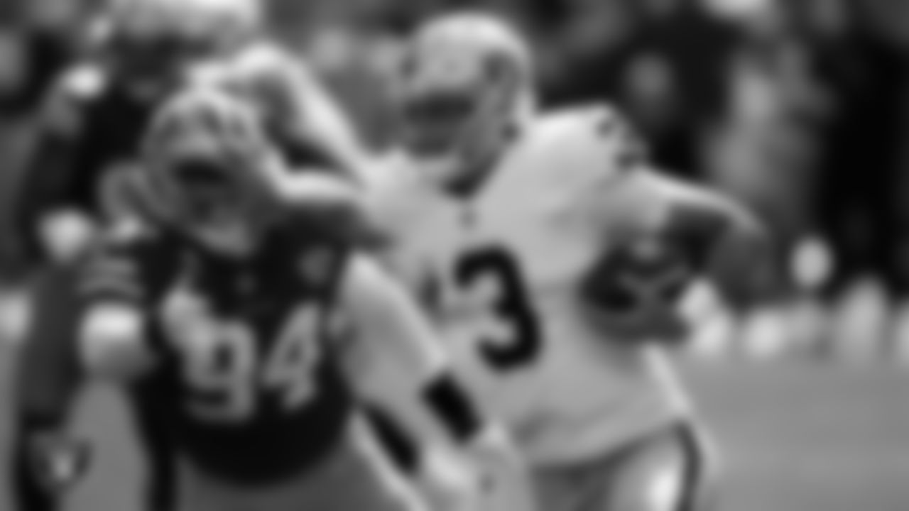 Las Vegas Raiders quarterback Nathan Peterman (3) stiff arms the defender during the preseason away game against the San Francisco 49ers.
