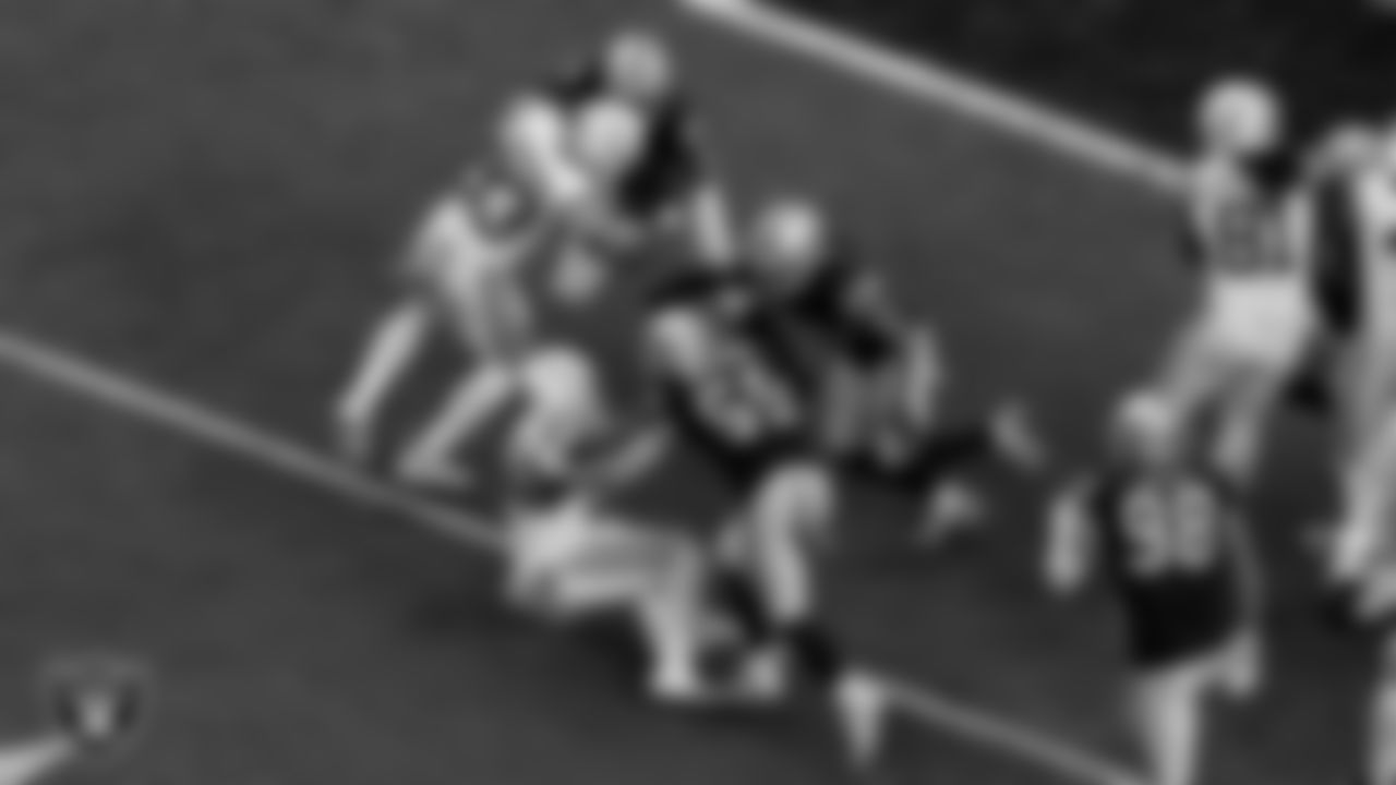 Las Vegas Raiders defensive end Chandler Jones (55), linebacker Luke Masterson (59) and safety Tre'von Moehrig (25) during the regular season home game against the Indianapolis Colts at Allegiant Stadium.
