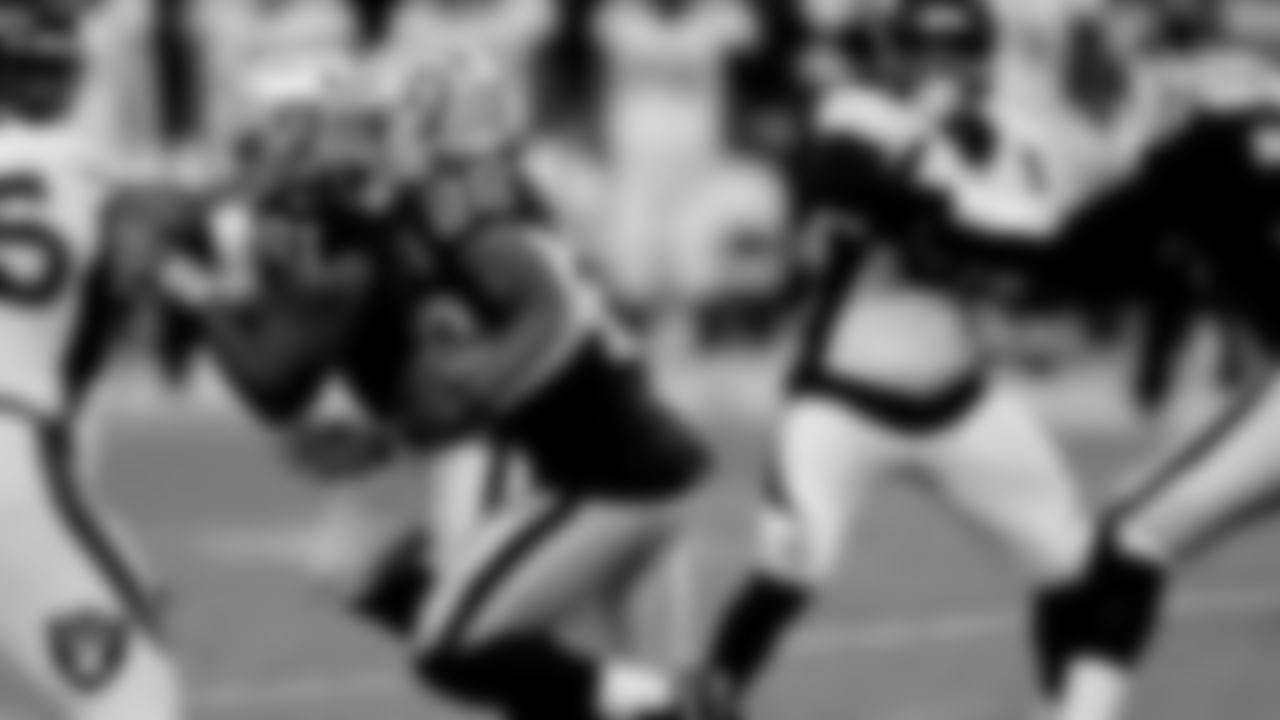Las Vegas Raiders running back Josh Jacobs (28) rushes during the regular season game against the Denver Broncos at Allegiant Stadium.
