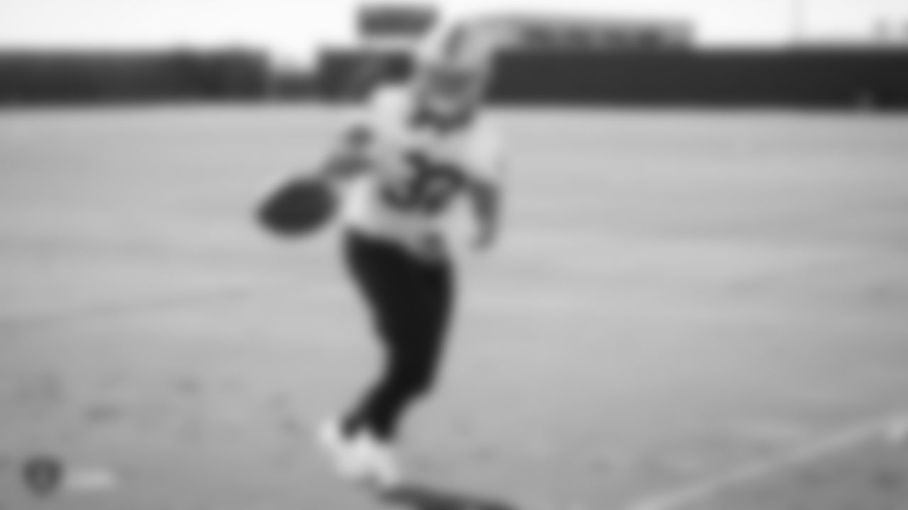 Oakland Raiders safety Dallin Leavitt (32) makes a catch during practice.
