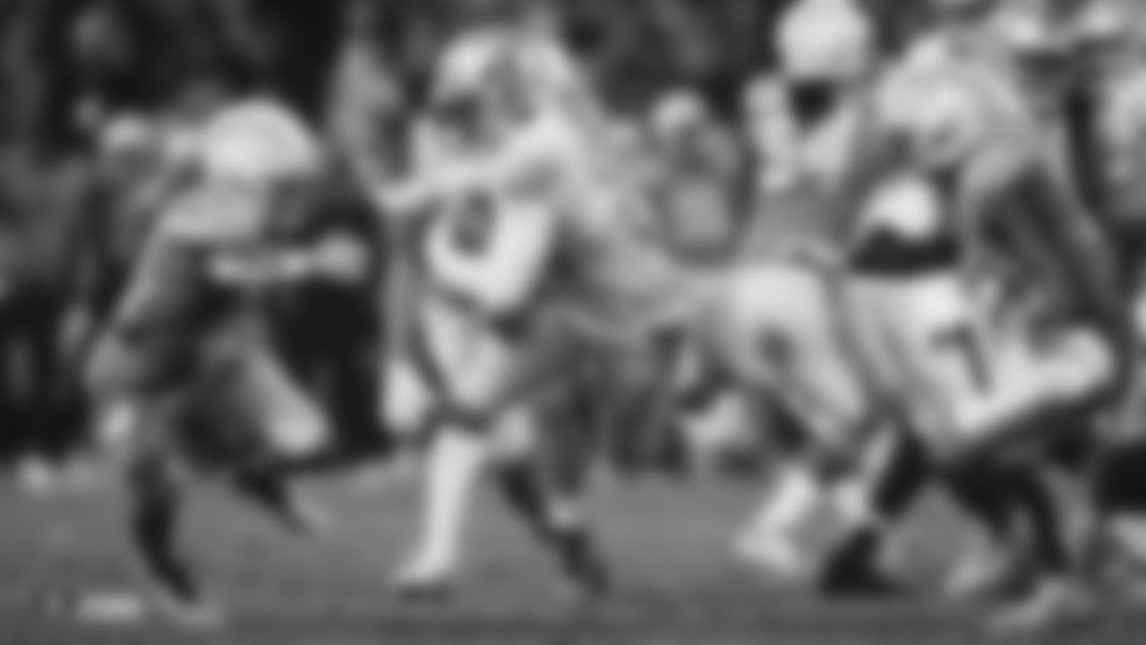 Raiders running back Josh Jacobs (28) rushes for an 18-yard touchdown during the regular season game against the Los Angeles Chargers.