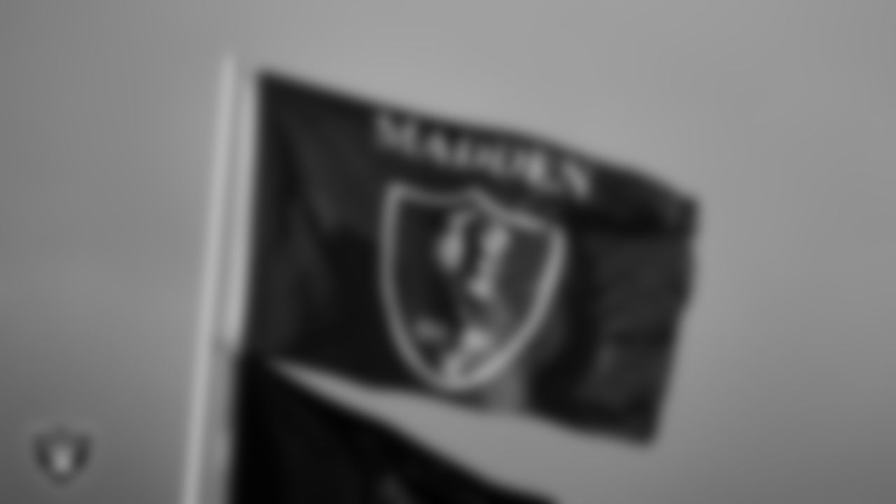 A flag honoring Las Vegas Raiders Hall of Famer John Madden flies in the sky before a memorial service in celebration of his life.