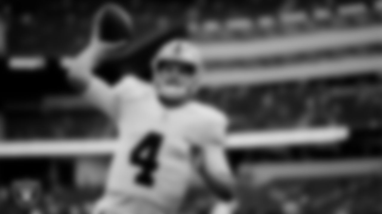 Las Vegas Raiders quarterback Aidan O'Connell (4) warming up before the regular season away game against the Los Angeles Chargers at SoFi Stadium.