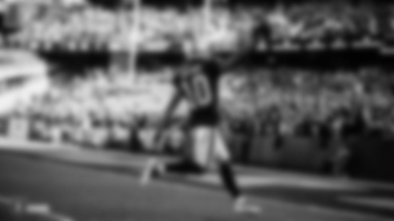 Raiders wide receiver Rico Gafford (10) makes a 49-yard touchdown catch during the regular season game against the Tennessee Titans at the Oakland-Alameda County Coliseum.