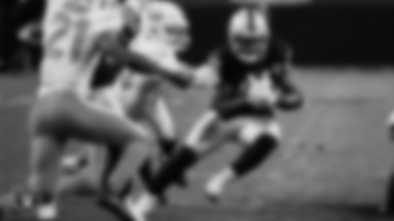 Las Vegas Raiders running back Josh Jacobs (28) rushes during the regular season home game against the Miami Dolphins.