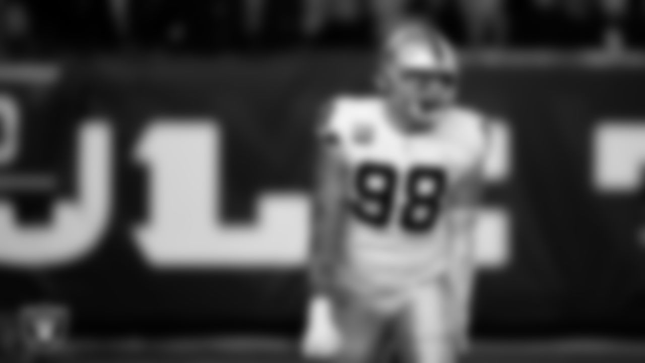 Las Vegas Raiders defensive end Maxx Crosby (98) celebrates after sacking the quarterback during the postseason away game against the Cincinnati Bengals.