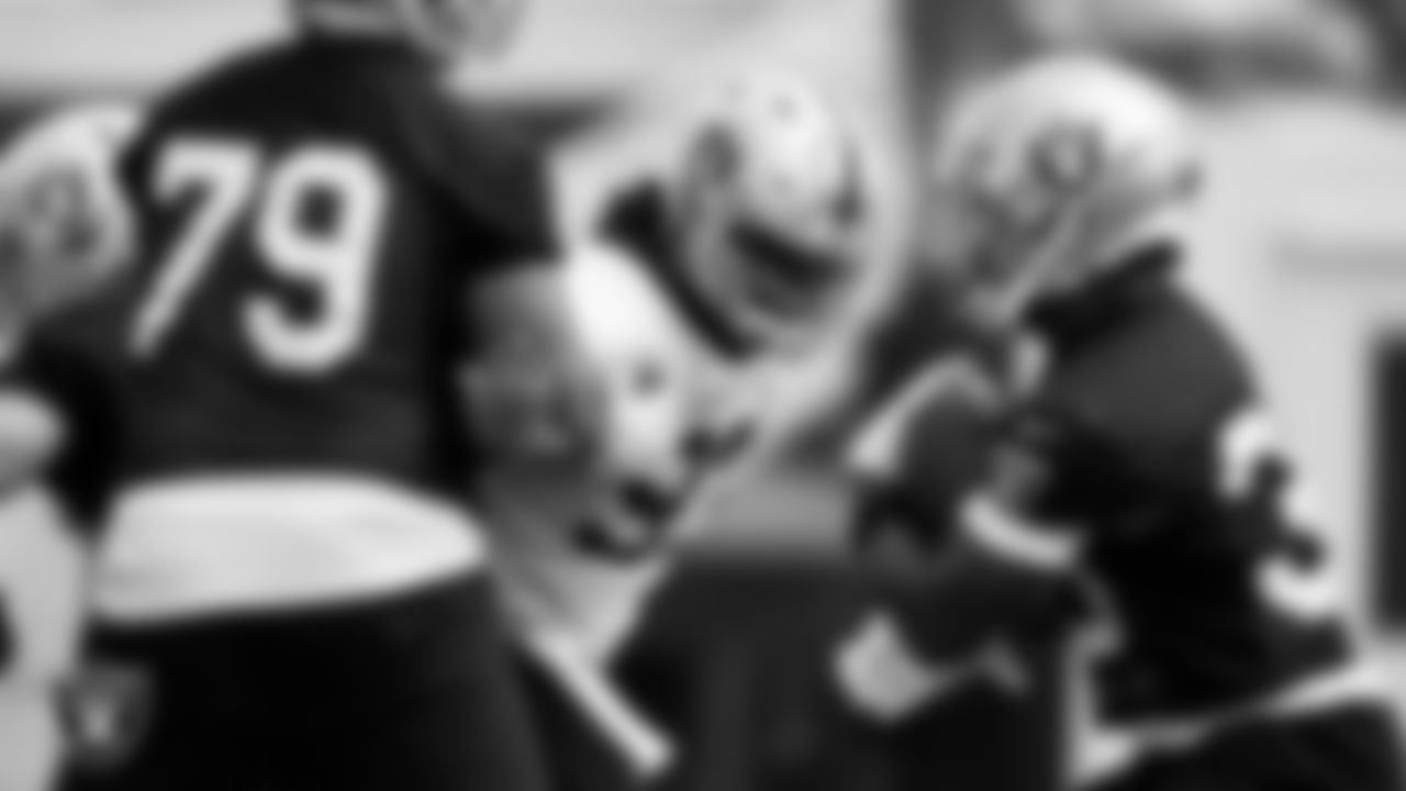 Las Vegas Raiders offensive lineman Jeremiah Poutasi (79) and defensive tackle Gerald McCoy (93) during practice at Intermountain Healthcare Performance Center.