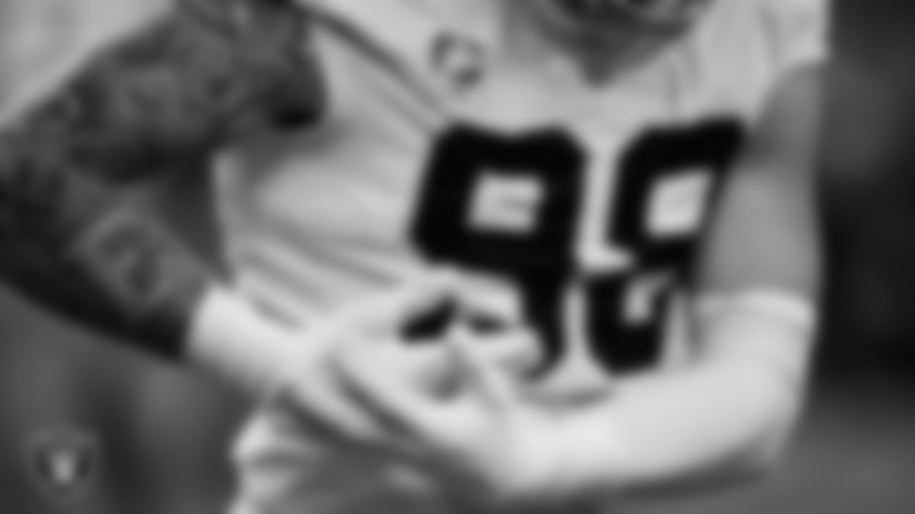 Las Vegas Raiders defensive end Maxx Crosby (98) on the field during the regular season away game against the Denver Broncos at Empower Field at Mile High.
