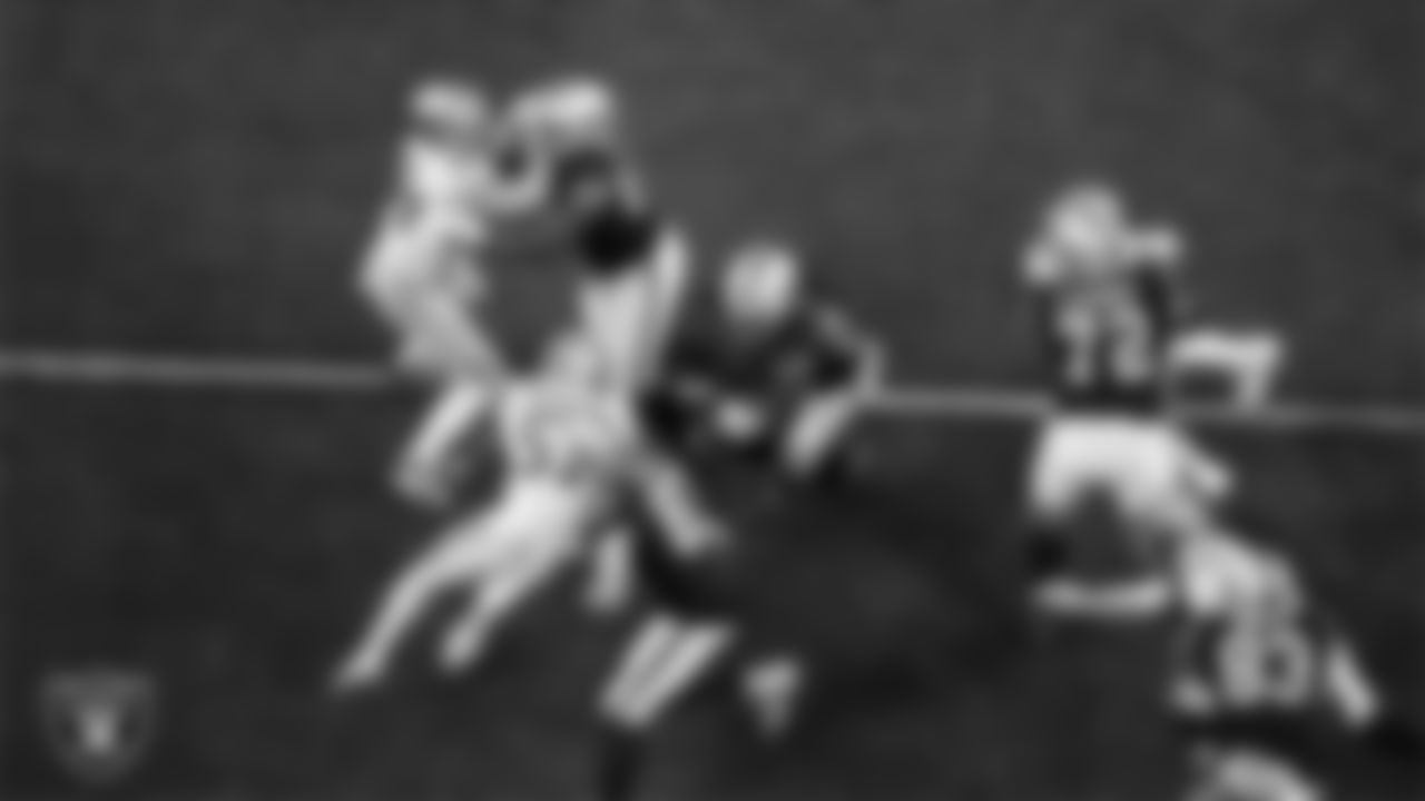 Las Vegas Raiders running back Brandon Bolden (34) rushes during the regular season home game against the San Francisco 49ers at Allegiant Stadium.