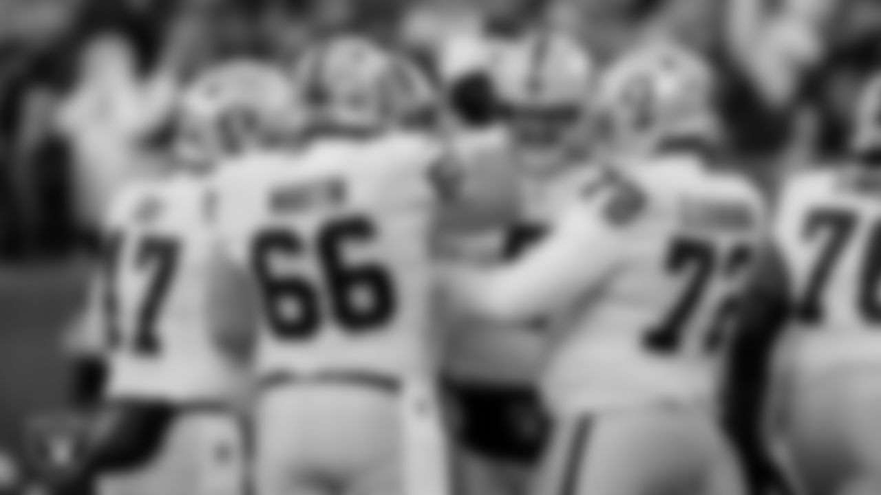 The Las Vegas Raiders celebrate after a 47-yard field goal during the postseason away game against the Cincinnati Bengals.