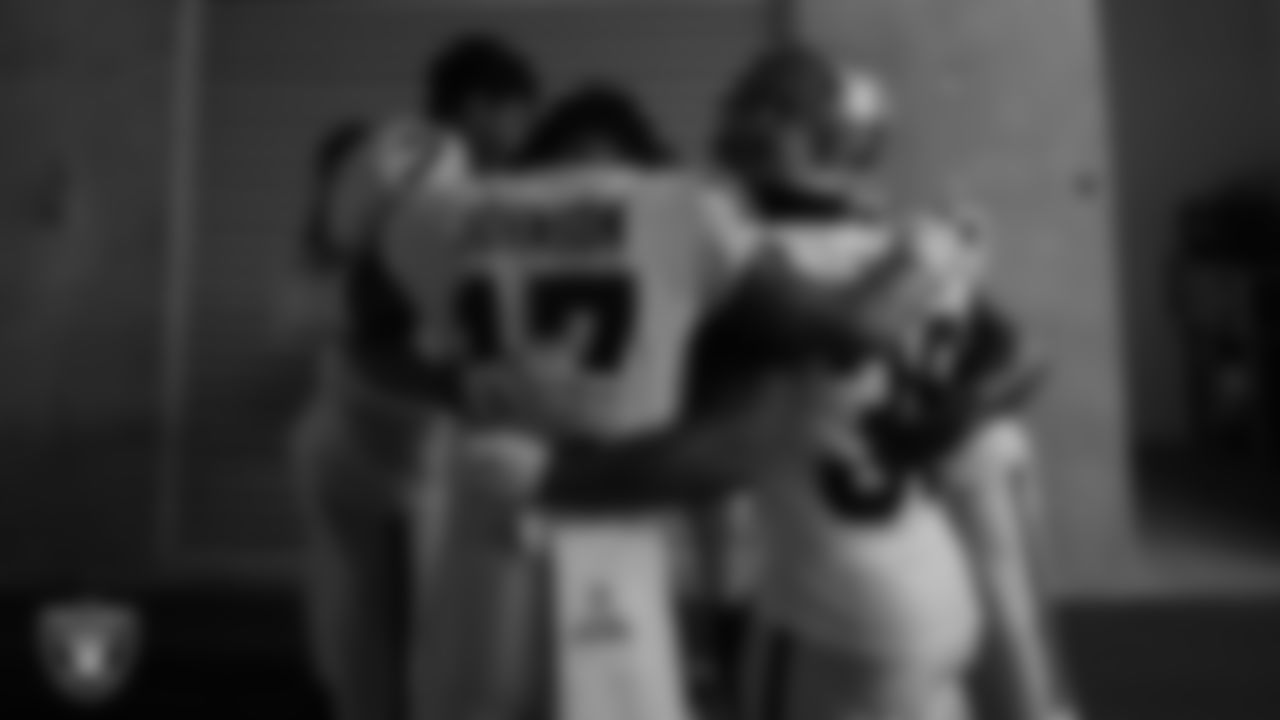 The Las Vegas Raiders returners huddle in the tunnel before the regular season away game against the Indianapolis Colts.