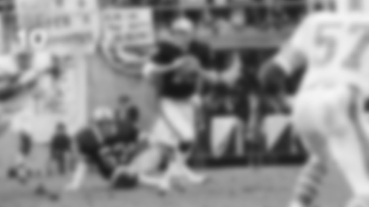 (7. Ken Stabler, 1974 AFC Divisional Playoff) In a 1974 AFC Divisional Playoff Game, quarterback Ken Stabler completed 20 of 30 pass attempts for 293 yards, 4 TDs and 1 INT in a 28-26 win over the Miami Dolphins.
