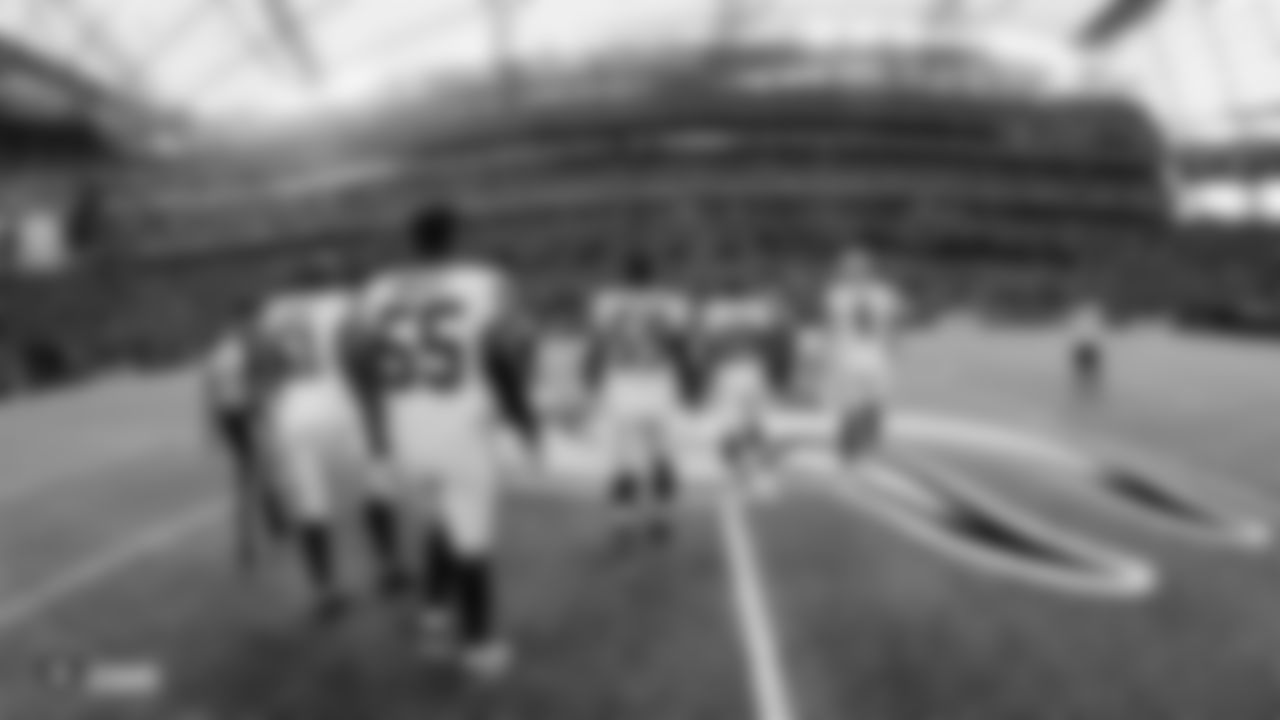Oakland Raiders quarterback Derek Carr (4), safety Lamarcus Joyner (29), linebacker Tahir Whitehead (59), linebacker Vontaze Burfict (55) and center Rodney Hudson (61) walk out to the center of the field for the coin toss before the Oakland Raiders regular season game against the the Minnesota Vikings at U.S. Bank Stadium.