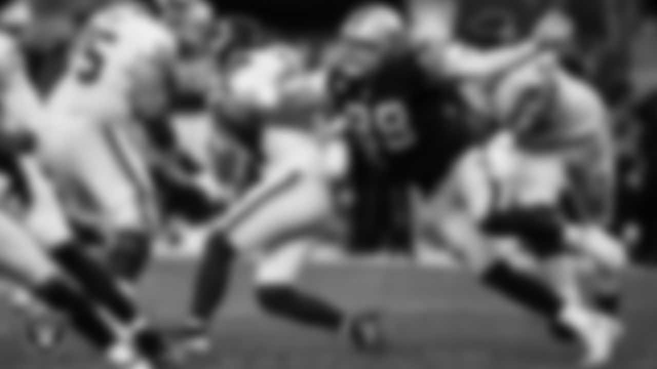 Las Vegas Raiders defensive end Maxx Crosby (98) pressures the quarterback during the regular season home game against the Washington Football Team.