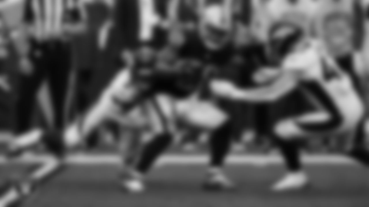 Las Vegas Raiders running back Josh Jacobs (28) rushes during the regular season home game against the Denver Broncos at Allegiant Stadium.