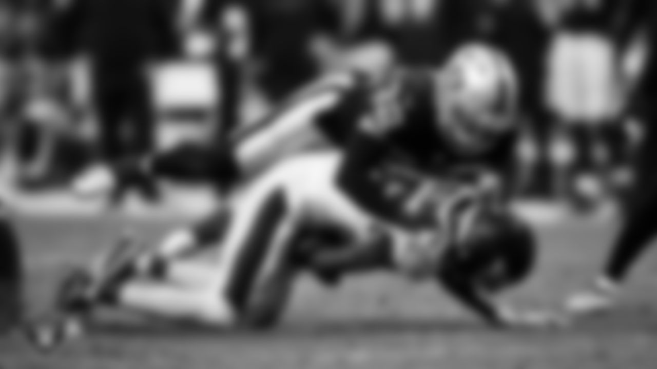 Las Vegas Raiders safety Dallin Leavitt (32) makes a tackle during the regular season home game against the Philadelphia Eagles.
