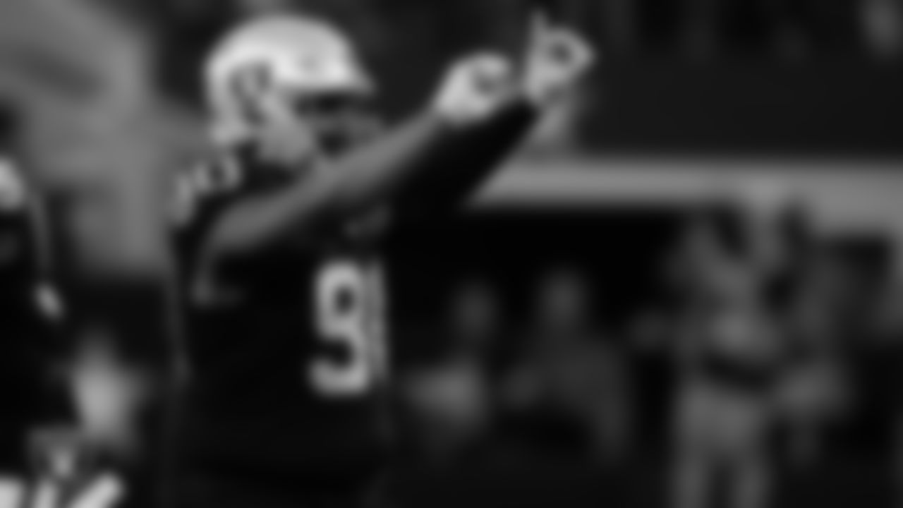 Las Vegas Raiders defensive tackle Johnathan Hankins (90) celebrates after the Dallas Cowboys missed on a field goal attempt.