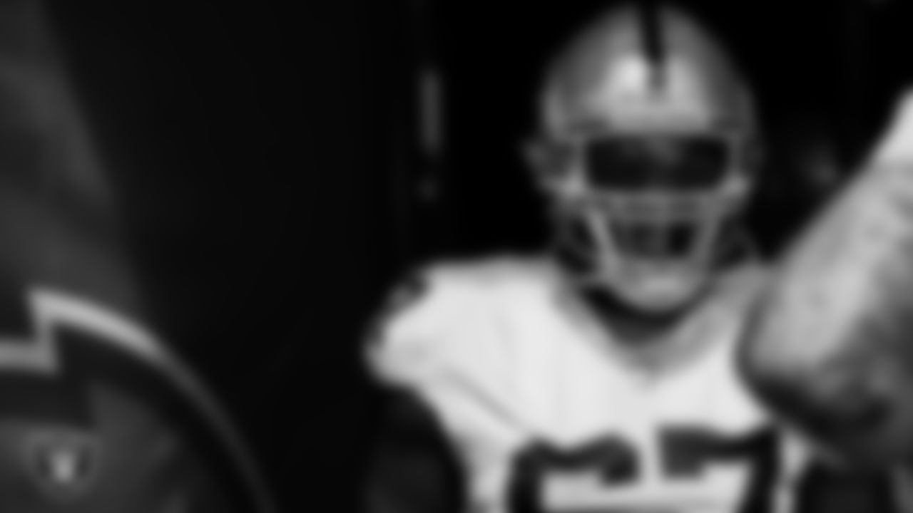 Las Vegas Raiders guard Lester Cotton Sr. (67) waits to be introduced onto the field before the regular season away game against the Los Angeles Chargers at SoFi Stadium.