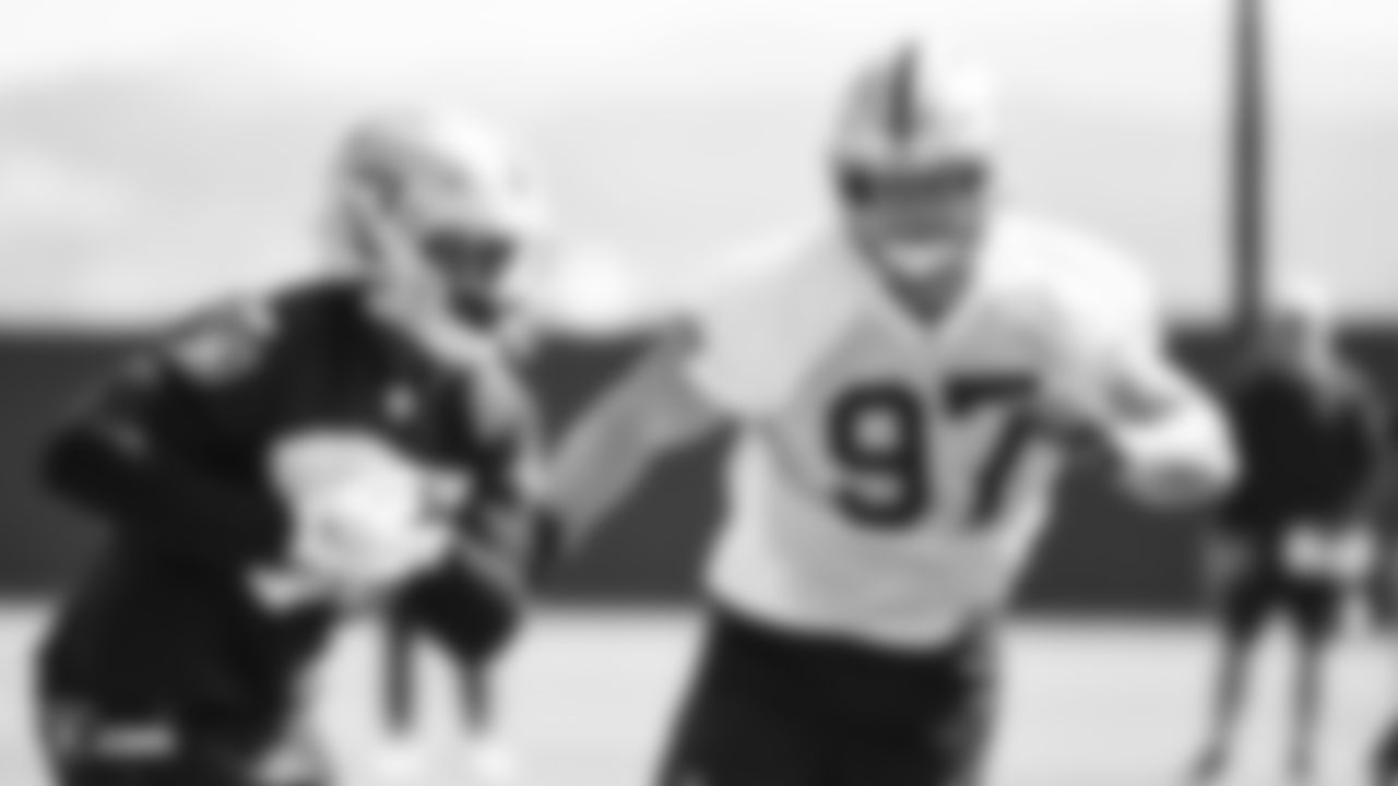 Raiders defensive end Josh Mauro (97) on the field for practice.