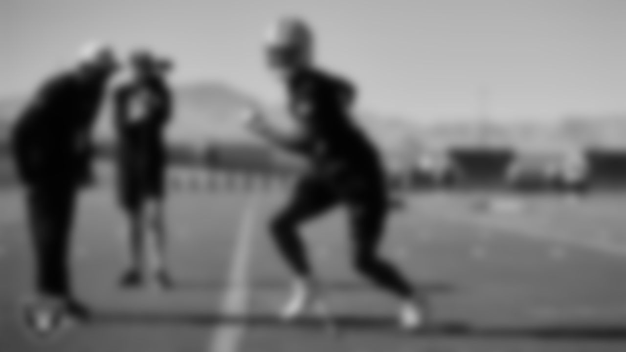 Las Vegas Raiders wide receivers coach Edgar Bennett and wide receiver Bryan Edwards (89) during practice at Intermountain Healthcare Performance Center.