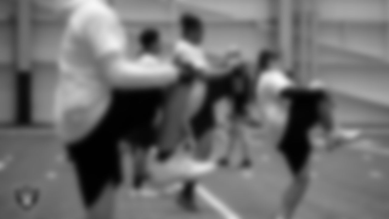 Athletes go through drills during the ELITE Academy at Las Vegas Raiders Headquarters.