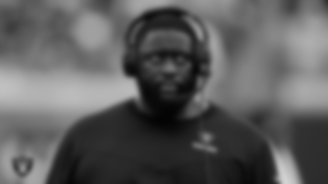 Las Vegas Raiders defensive line coach Frank Okam on the sidelines during the regular season away game against the Jacksonville Jaguars at TIAA Bank Field.