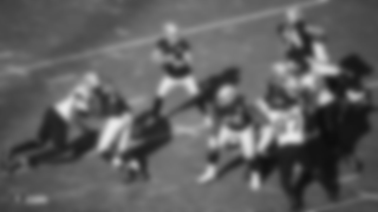 Raiders quarterback Derek Carr (4) looks for a receiver during the regular season game against the Jacksonville Jaguars.