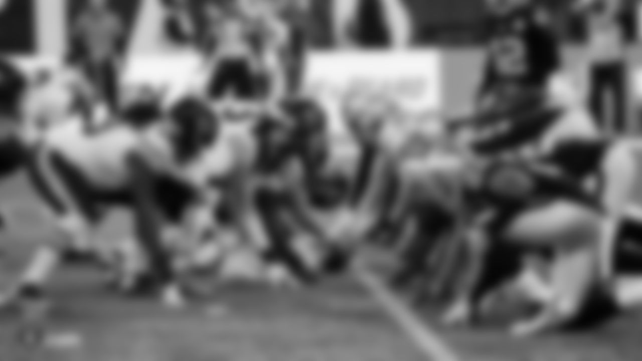 The Raiders line up before the snap during the game against the Chicago Bears at Tottenham Hotspur Stadium.