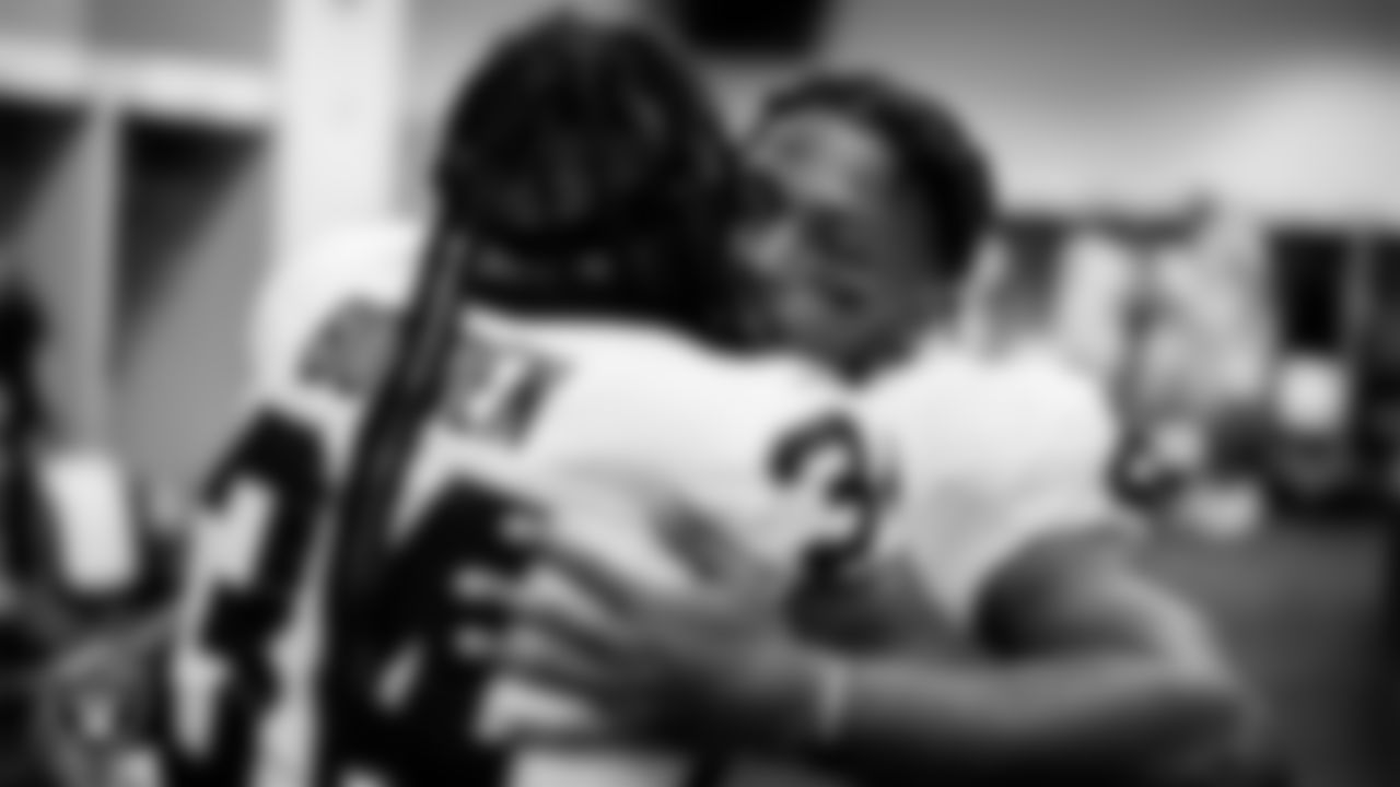 Las Vegas Raiders running back Brandon Bolden (34) and running back Josh Jacobs (8) in the locker room after the regular season away game against the Denver Broncos at Empower Field at Mile High.