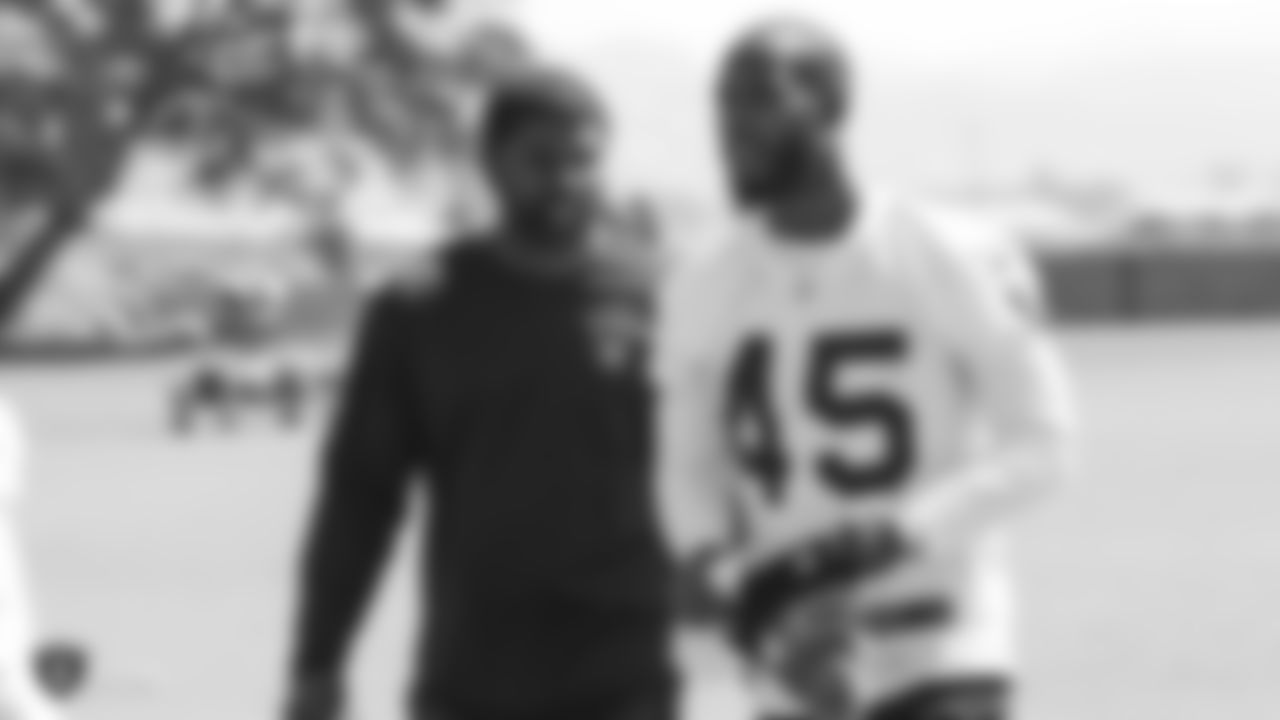 Oakland Raiders defensive backs coach Derrick Ansley talking to cornerback Dominique Rodgers-Cromartie (45) on the field for practice at 2018 at the Oakland Raiders Practice Facility Saturday, September 8, 2018, in Alameda, California.
