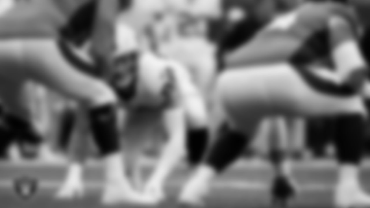 Las Vegas Raiders defensive end Maxx Crosby (98) lines up before the snap during the regular season away game against the Denver Broncos at Empower Field at Mile High.