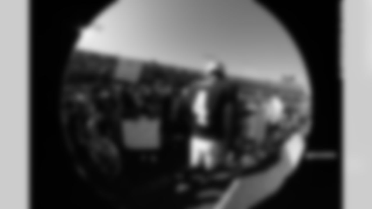 QB Derek Carr spends some time with his fans before the game.