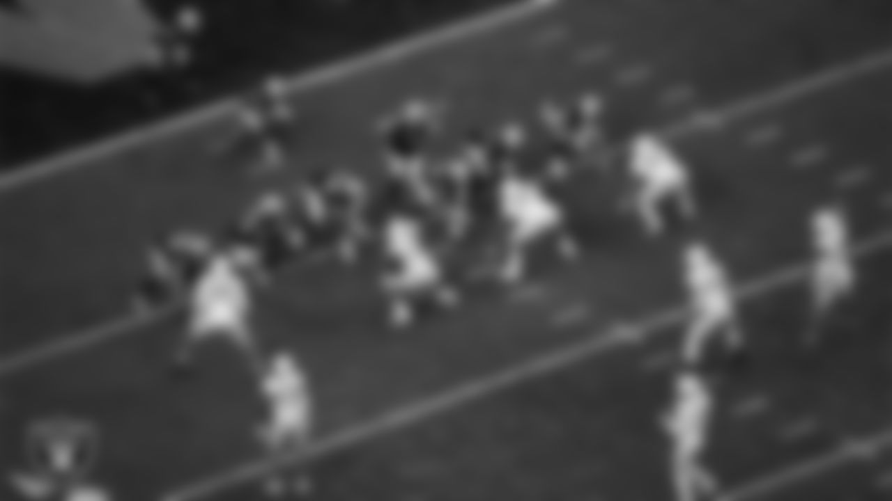 Las Vegas Raiders quarterback Derek Carr (4) calls a play at the line of scrimmage during the regular season home game against the Los Angeles Chargers at Allegiant Stadium.