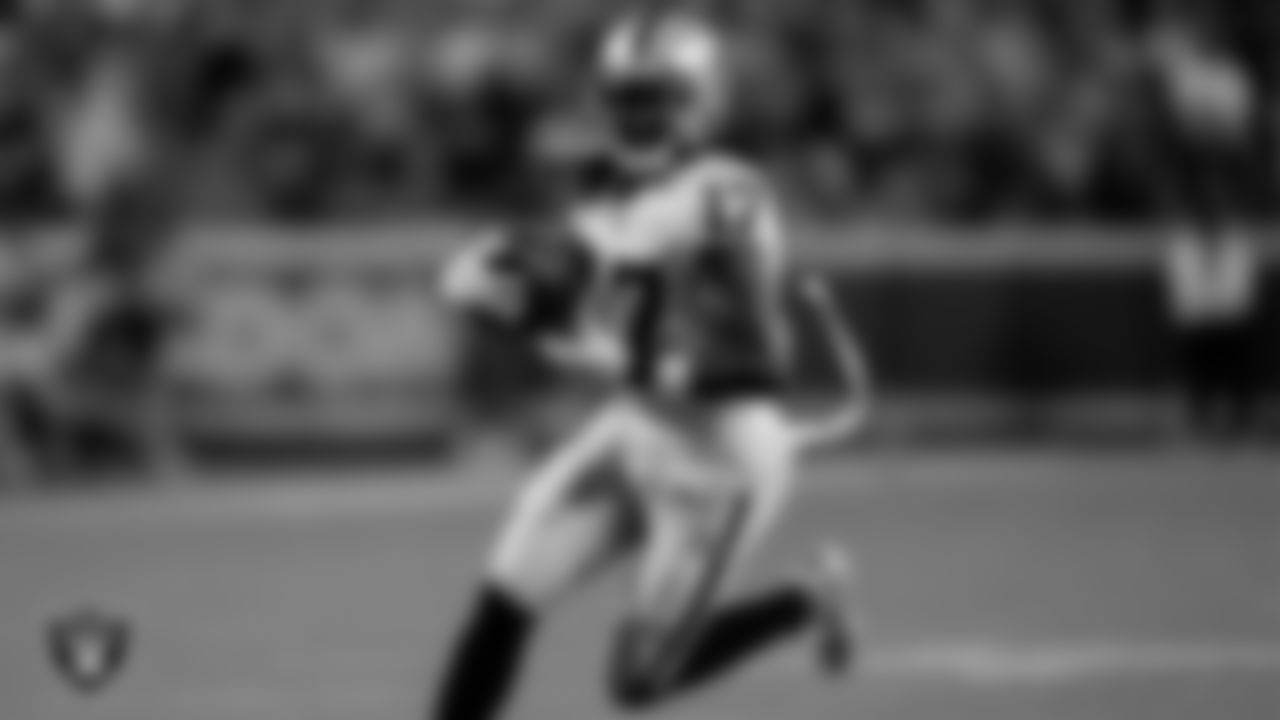 Las Vegas Raiders wide receiver Davante Adams (17) heads to the end zone on a 58-yard touchdown catch during the regular season away game against the Kansas City Chiefs at GEHA Field at Arrowhead Stadium.
