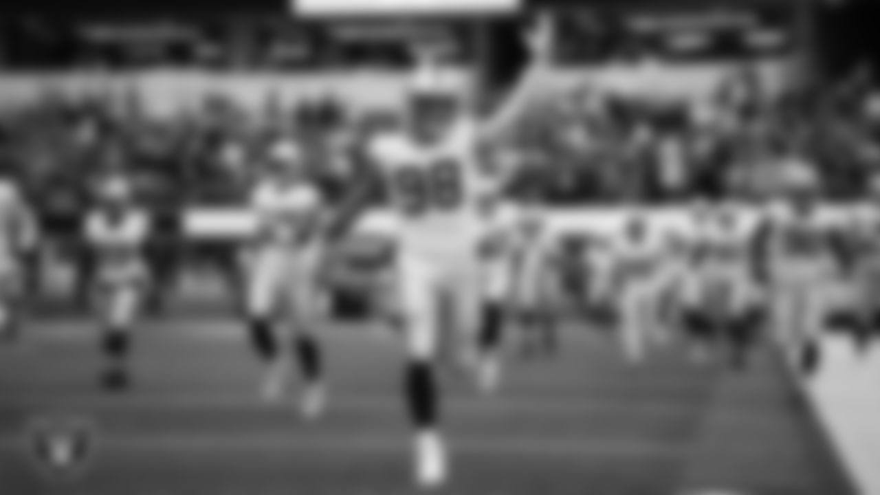 Las Vegas Raiders defensive end Maxx Crosby (98) enters the field before the regular season away game against the Los Angeles Chargers at SoFi Stadium.
