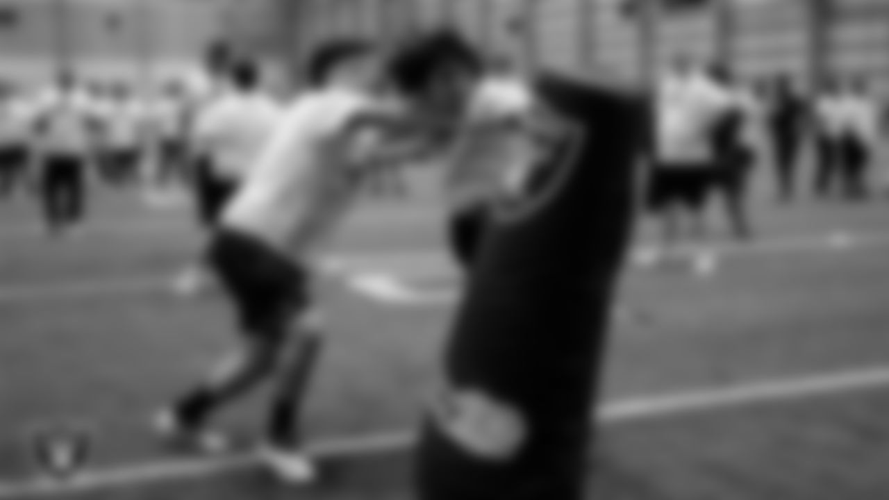 Athletes participate in drills during the ELITE Academy at Las Vegas Raiders Headquarters.