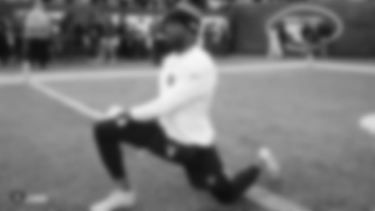 The Raiders warm up before the regular season game against the New York Jets at MetLife Stadium.