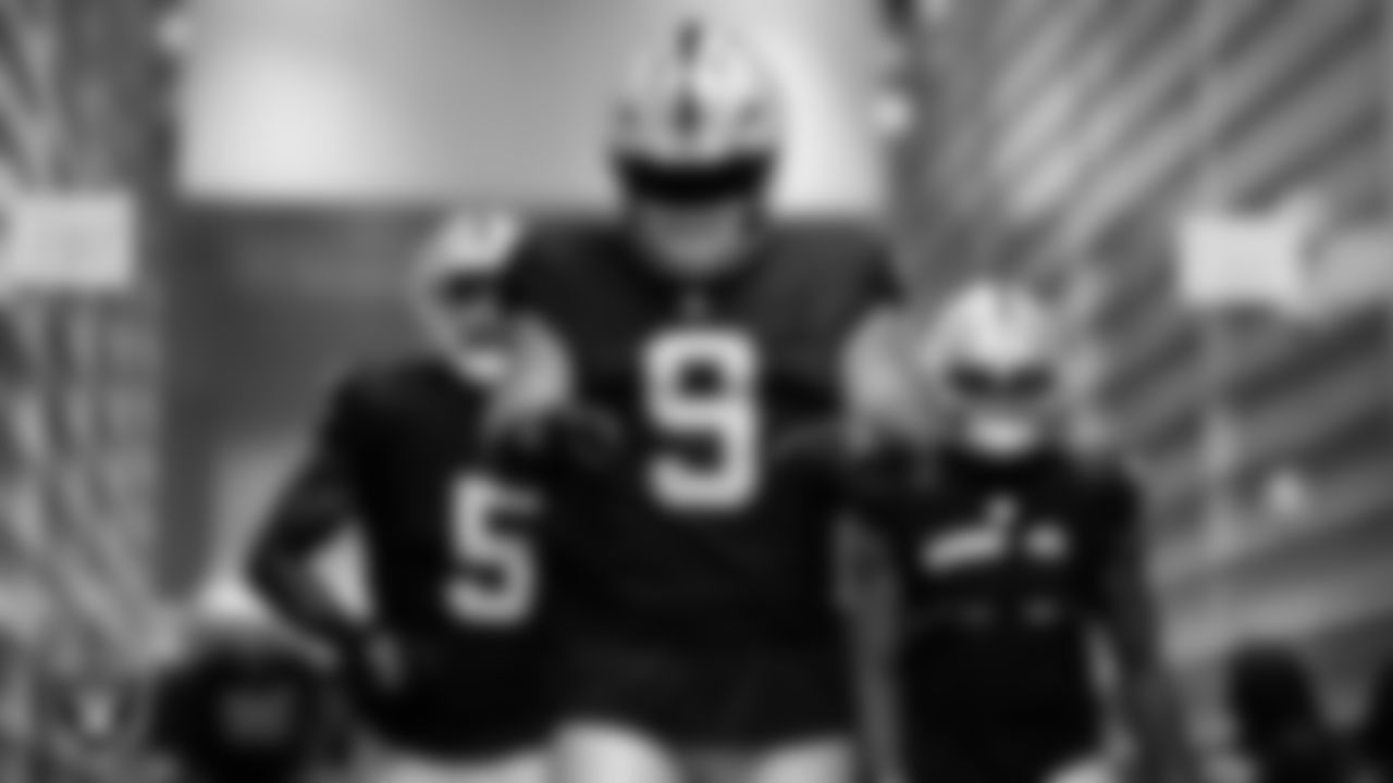 Las Vegas Raiders defensive end Tyree Wilson (9) walks down the tunnel before the preseason away game against the Dallas Cowboys at AT&T Stadium.
